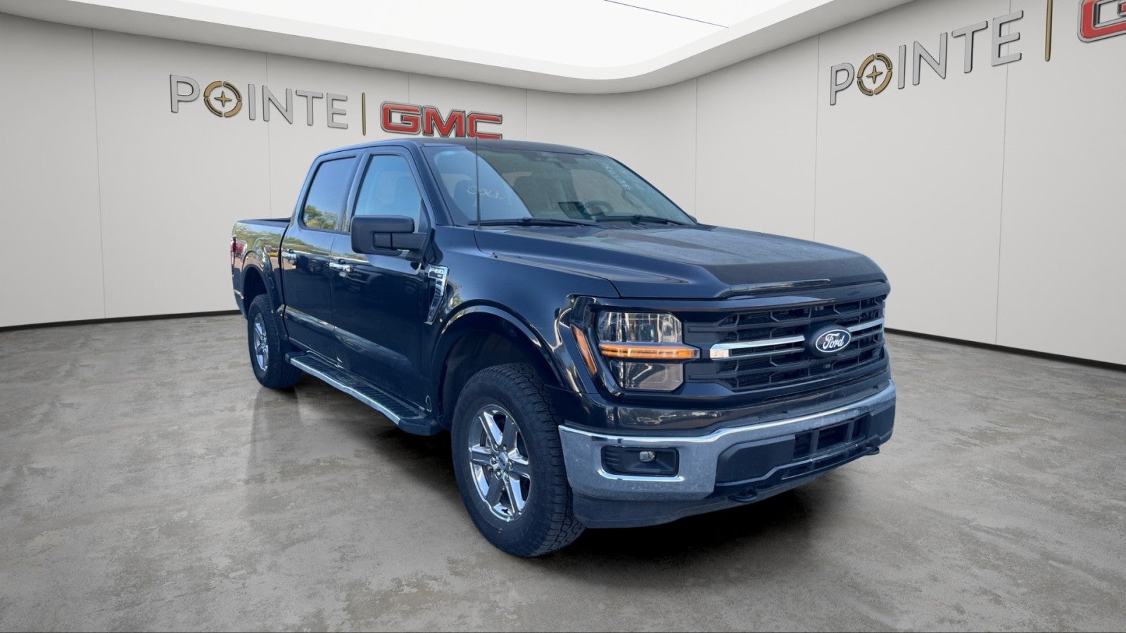 2025 Ford F-150 XLT in Black — front three-quarter view