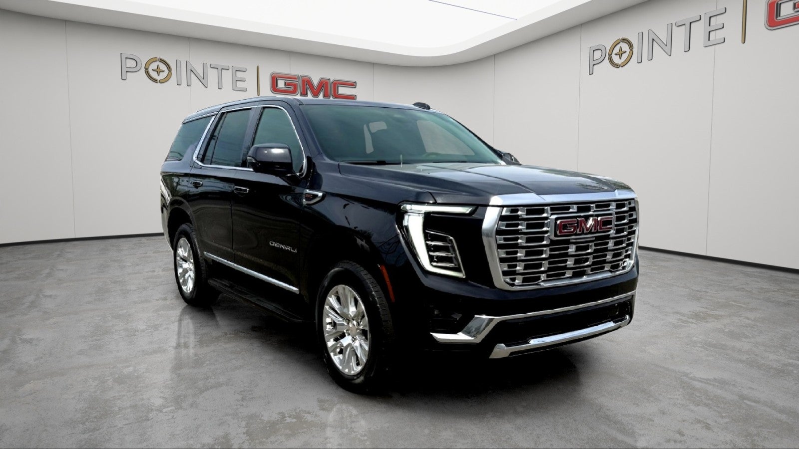 2025 GMC Yukon Denali in Onyx Black — front three-quarter view