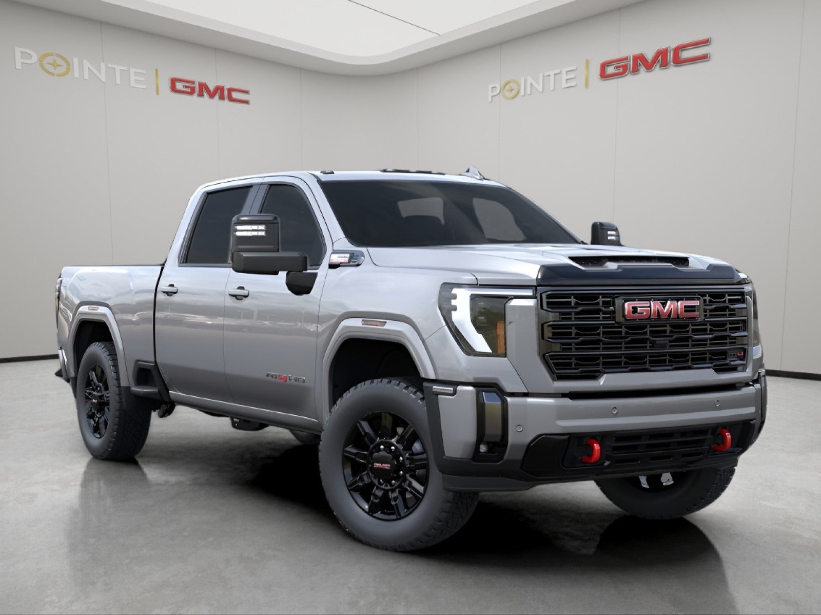 2026 GMC Sierra 2500 HD AT4 in Sterling Metallic — front three-quarter view