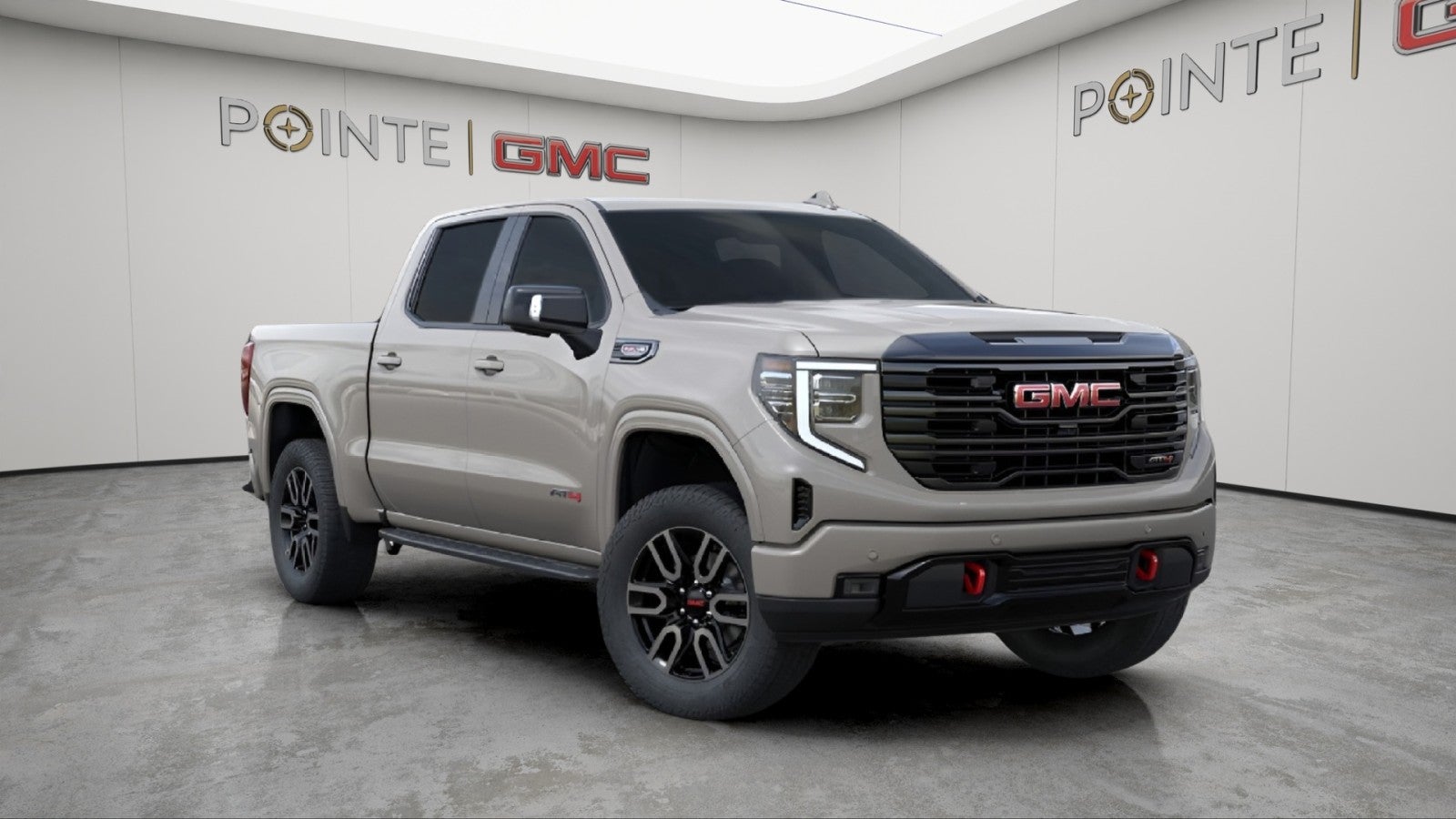 2026 GMC Sierra 1500 AT4 in Coastal Dune — front three-quarter view