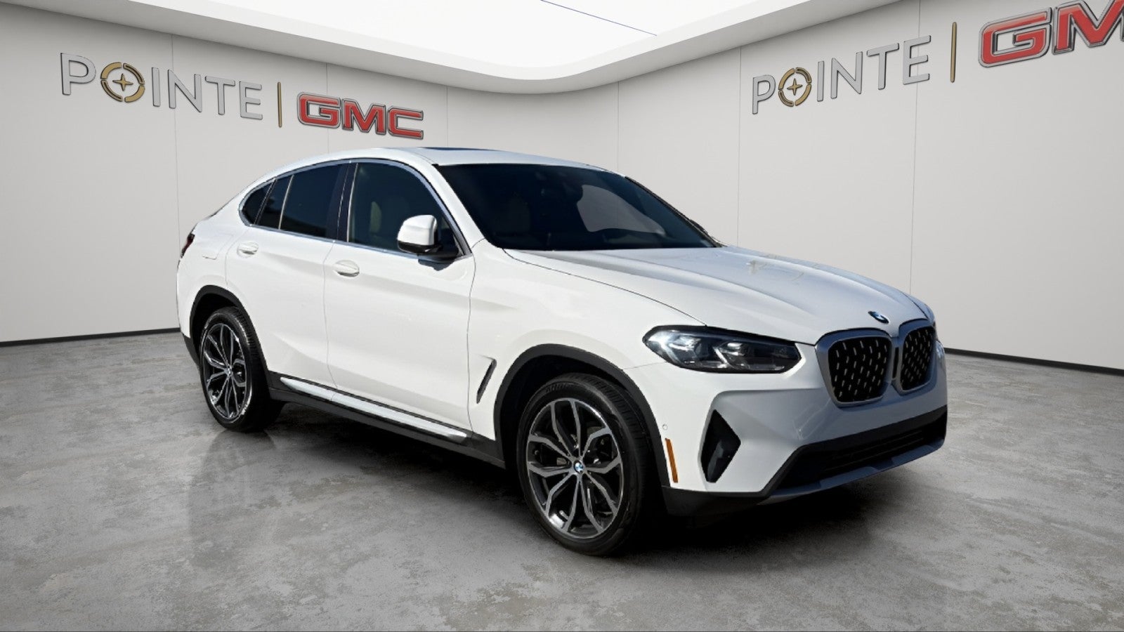 2023 BMW X4 xDrive30i in White — front three-quarter view