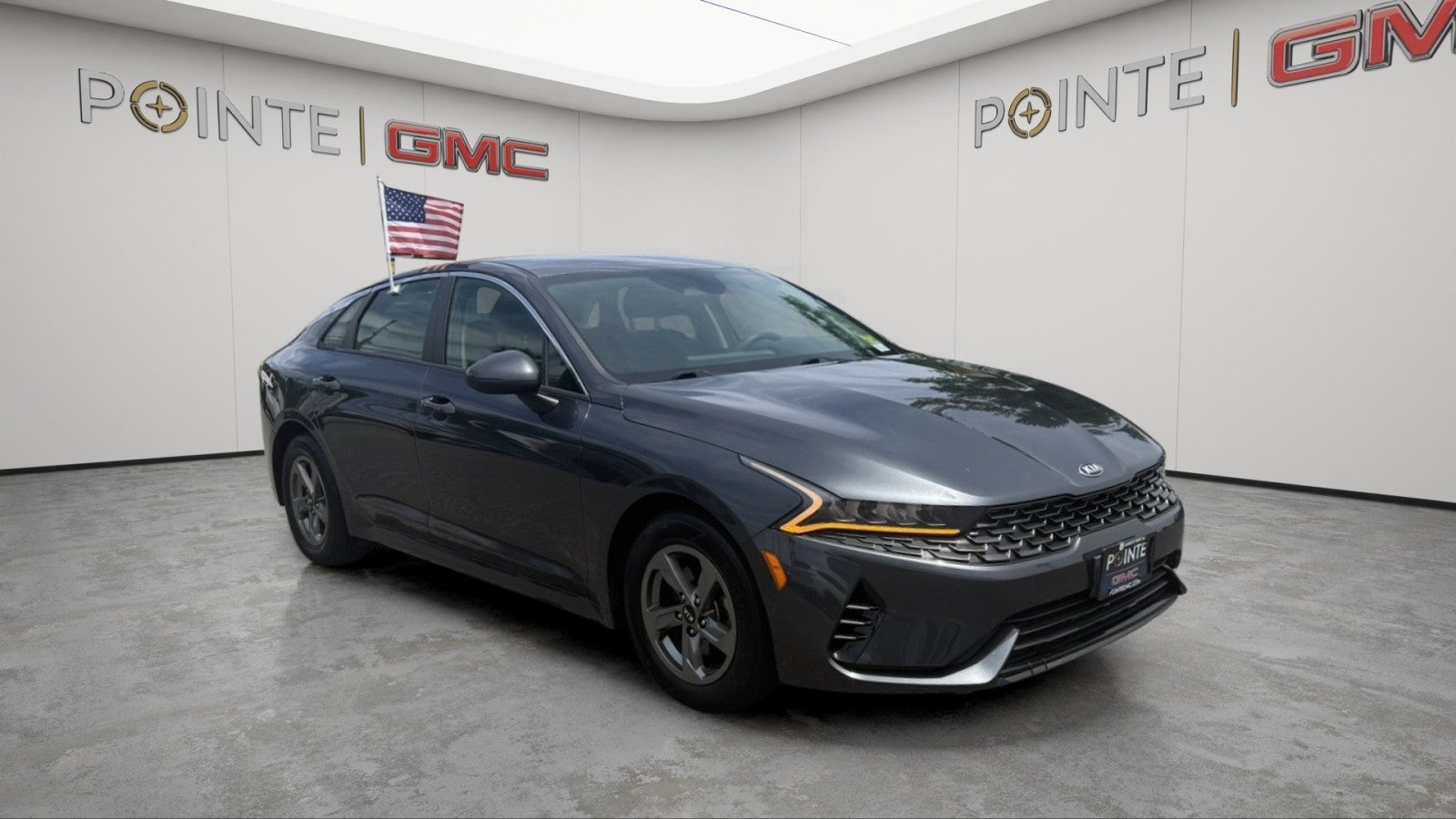 2021 Kia K5 LXS in Gray — front three-quarter view