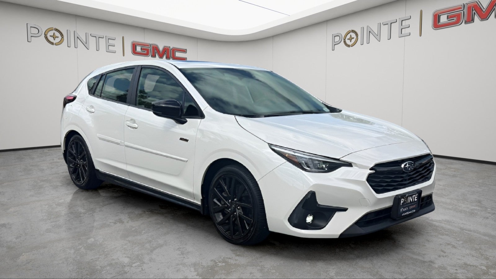 2024 Subaru Impreza RS in White — front three-quarter view